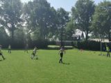 Laatste training S.K.N.W.K. JO11-1 van dit seizoen (97/110)