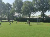 Laatste training S.K.N.W.K. JO11-1 van dit seizoen (100/110)