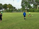 Laatste training S.K.N.W.K. JO13-1 van dit seizoen (19/25)