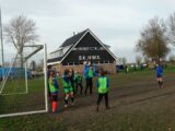 Onderlinge wedstrijd S.K.N.W.K. JO11-1 en JO13-1 (zaterdag 19 december 2020) (58/97)